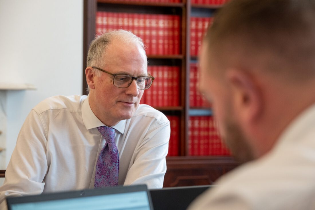 Barrister working at a desk in chambers